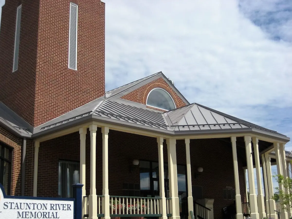 Skilled roofing craftsmen working on a residential roof in Wausau